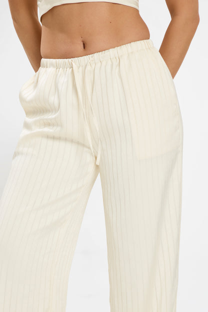SATIN FLARED PANTS  | TEXTURED IVORY CREAM